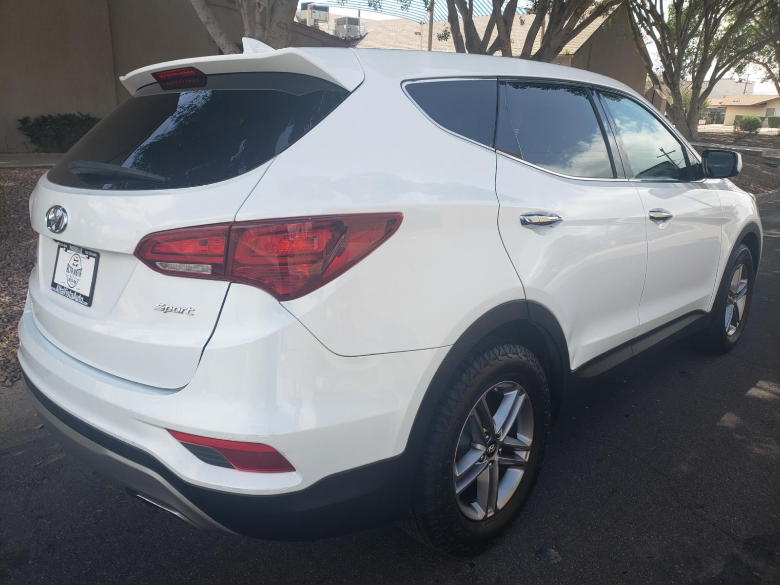 2017 WHITE /gray and black Hyundai Santa Fe SE sport (5NMZT3LB6HH) with an 2.4L L4 DOHC 16V engine, 4-Speed Automatic transmission, located at 323 E Dunlap Ave., Phoenix, AZ, 85020, (602) 331-9000, 33.567677, -112.069000 - 2017 Hyundai Santa Fe Sport,........A Must See!! No accidents, Ice cold AC. The SUV is gorgeous inside and out. Power windows, Power door locks, Touch screen Stereo/CD Player, Phone sync, Bluetooth, Backup camera, Beautiful gray and black interior with gray cloth seats in near perfect condition, Inc - Photo #3